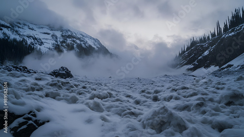 A time-lapse of an avalanche debris field settling after the snow has stopped moving with the snow solidifying into dense mounds.