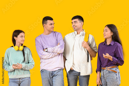 Young people waiting in lin...