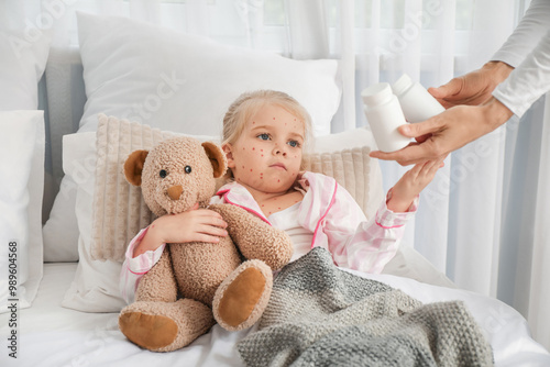 Little girl ill with chicke...