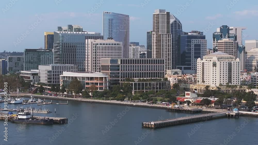 Aerial view of the scenic San Diego downtown financial district city skyline and skyscrapers. Marriott Marina and Convention Center at San Diego Bay. Aerial view of the scenic San Diego downtown financial district city skyline and skyscrapers. Marriott Marina and Convention Center at San Diego Bay.