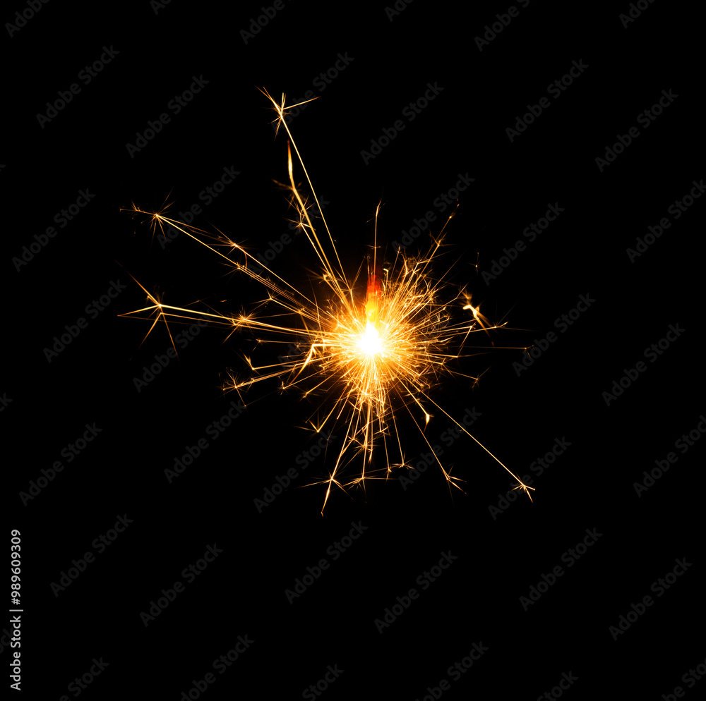 Christmas sparkler burning isolated on black background... Christmas sparkler burning isolated on black background...