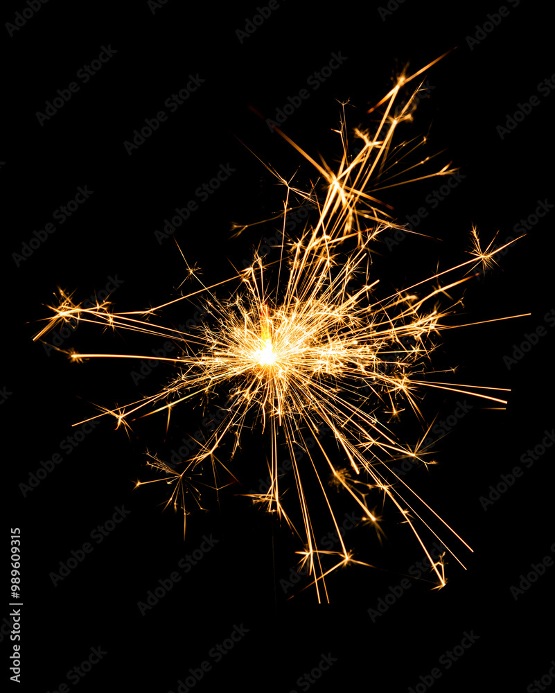 Christmas sparkler burning isolated on black background... Christmas sparkler burning isolated on black background...