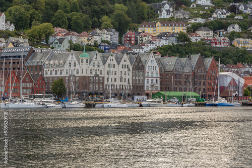 Ancient Colorful Wooden Buildings in the Bryggen Wharf Area, Bergen, Norway as Seen from the Nordnes Peninsula Across the Harbor photo