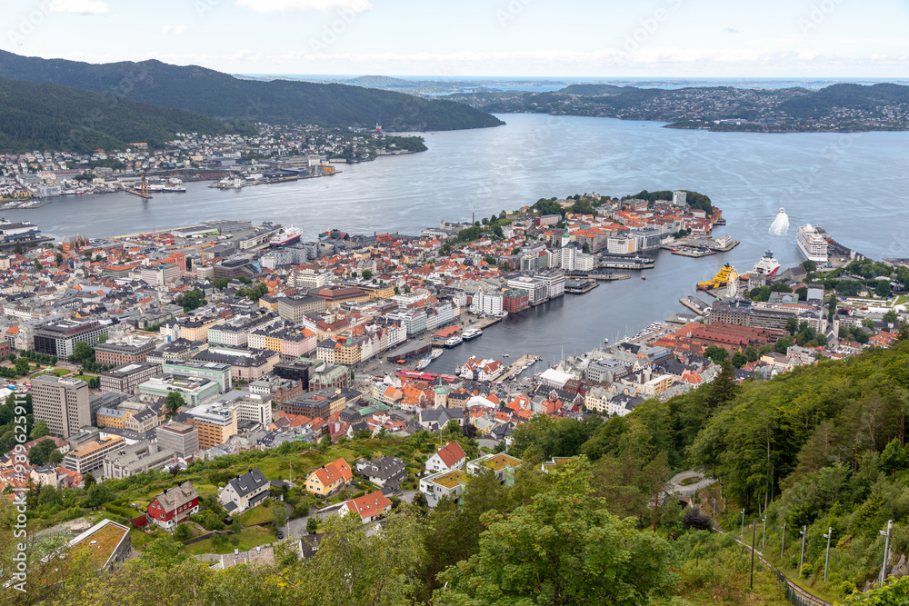 View of the City, Harbor and Mountains surrounding Bergen Norway from Atop Mount Fløyen at the Fløibanen Funicular Station View of the City, Harbor and Mountains surrounding Bergen Norway from Atop Mount Fløyen at the Fløibanen Funicular Station