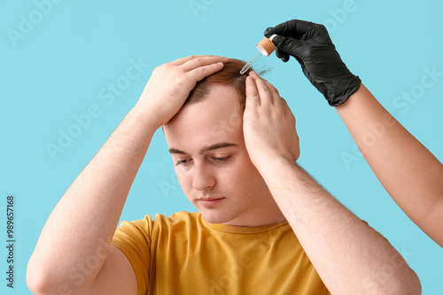 Young redhead man receiving...