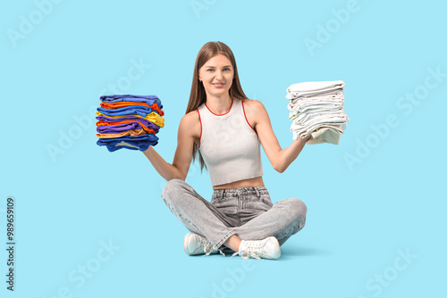 Young woman with stacks of ...