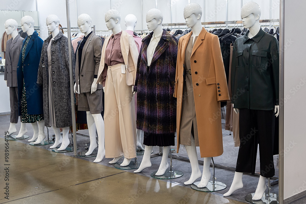 custom made wallpaper toronto digitalFemale mannequins in warm clothes on display in a clothing store