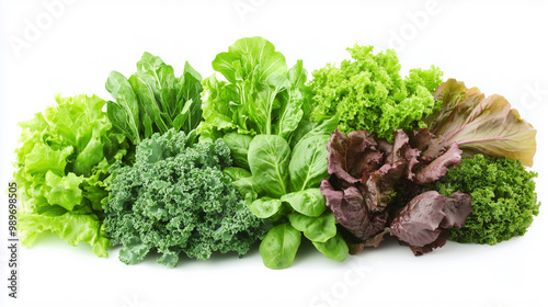 Fresh greens including lettuce, kale, and spinach arranged in vibrant display, showcasing variety of textures and shades of green, perfect for healthy meals.