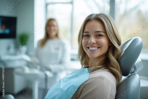 Young woman smiling in dentist chair during dental checkup