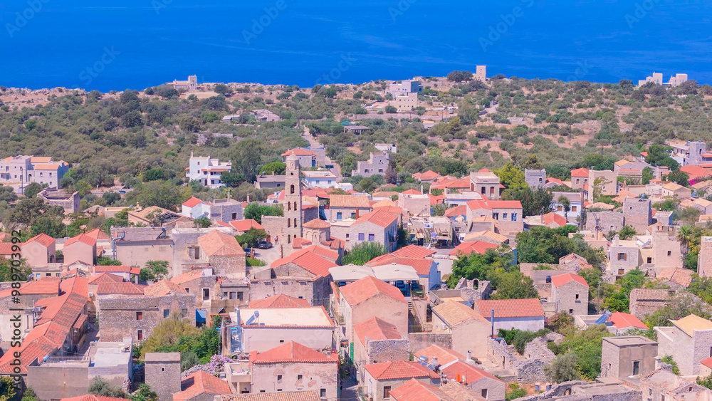 Fototapeta premium greece peloponnese region limeni town seaside and architecture stone houses beaches and church aerial view