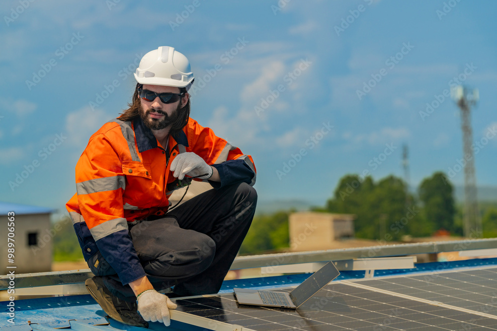 Worker Technicians are working to construct solar panels system on roof. Installing solar photovoltaic panel system. Men technicians walking on roof structure to check photovoltaic solar modules.