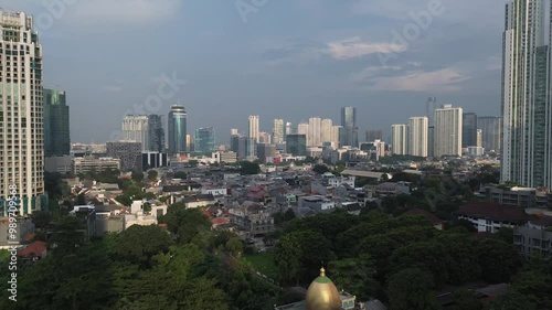 magnificent skyscrapers such as office buildings, hotels and towering apartments with modern and futuristic architecture in Jakarta, Indonesia. 4k drone aerial building
