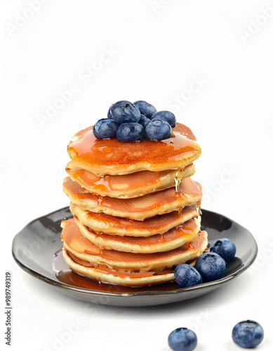 Delicious Stack of Pancakes with Blueberries and Syrup