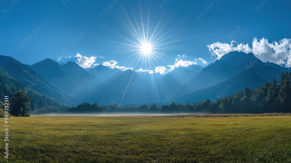 Obraz premium Panoramic view of mountain landscape during a golden sunset