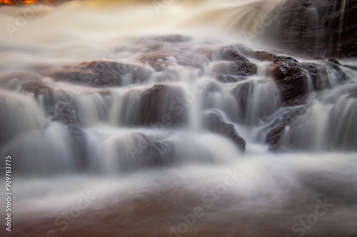 Silky water flowing over rocks.