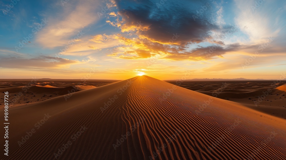 A stunning panoramic view of a vast desert landscape at sunset, featuring intricate sand patterns on a tall dune. A stunning panoramic view of a vast desert landscape at sunset, featuring intricate sand patterns on a tall dune.