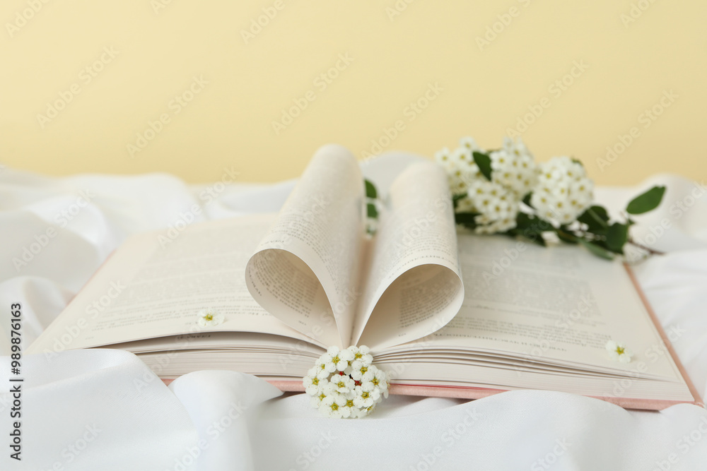 Aesthetics of books with flowers on a light background. Aesthetics of books with flowers on a light background.