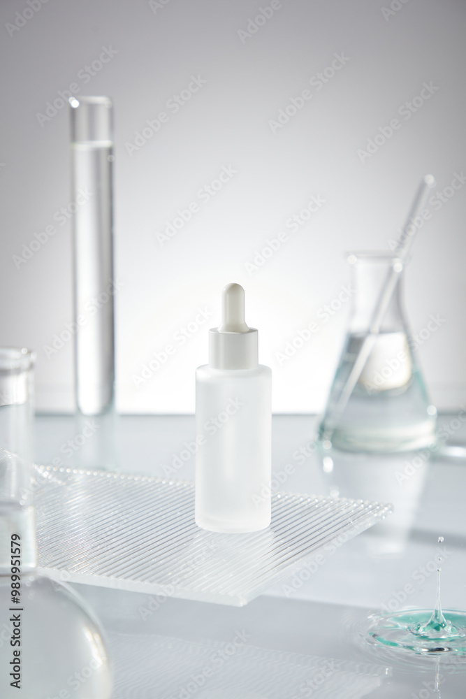 A white background and rugged platform display unlabeled serum bottles, surrounded by glass equipment laboratory with transparent solution placed on clean water surface. A white background and rugged platform display unlabeled serum bottles, surrounded by glass equipment laboratory with transparent solution placed on clean water surface.