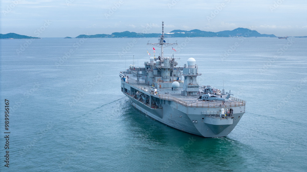 Nuclear war ship, Navy ship, Military navy carrier Helicopter. nuclear carrier running in the ocean. Nuclear war ship, Navy ship, Military navy carrier Helicopter. nuclear carrier running in the ocean.