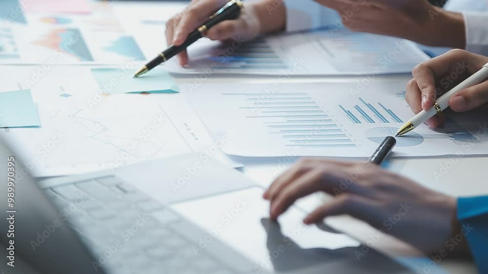 Business people are analyzing and planning business strategies. Business people are analyzing and planning business strategies.