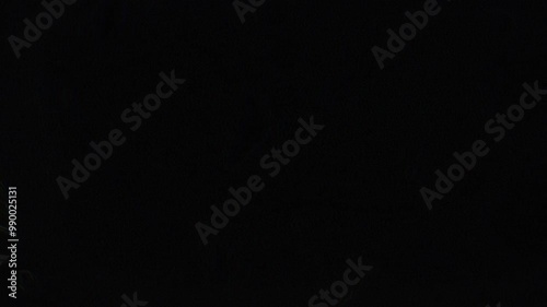Light leaks and film style distortion effects animation on a black background