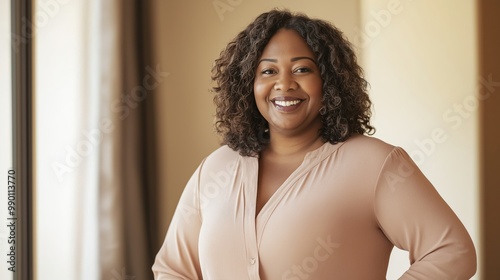 Confident African American Woman in Her Early 40s Smiling Indoors for Professional Use, Portraits, Business, and Diversity Campaigns