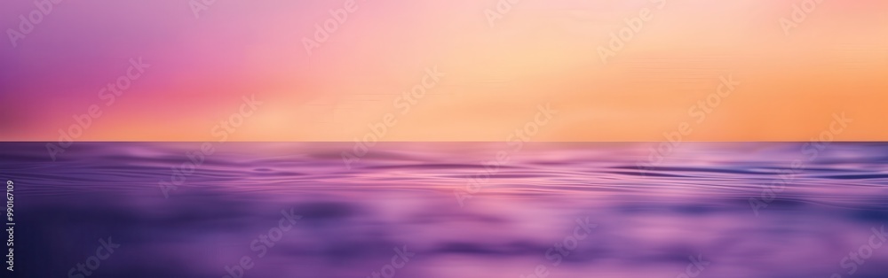 Obraz premium A beautiful ocean scene with a purple and pink sky
