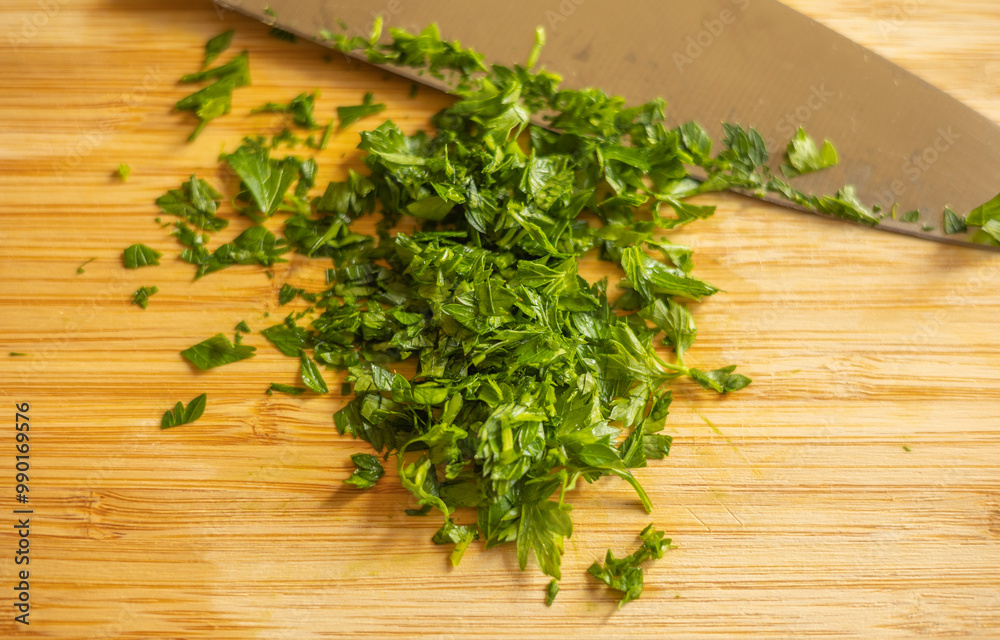 Chopped Parsley on a Cutting Board Close-Up Chopped Parsley on a Cutting Board Close-Up