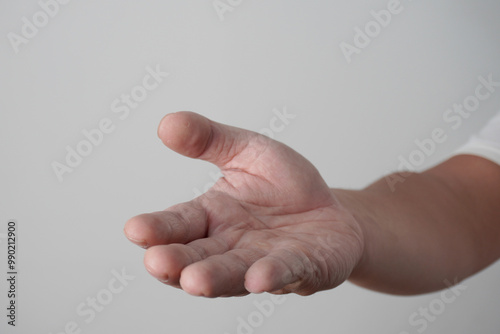 Male person hand receiving gesture, asking for help or donation