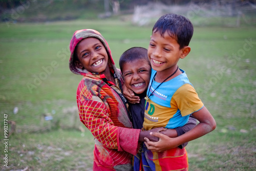 South asian rural kids passing happy time together in a riverside area 