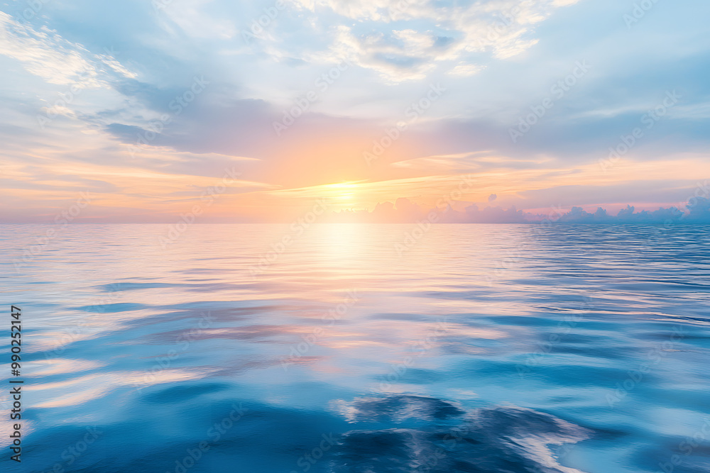 Fototapeta premium Golden sunset paints the ocean and sky with vibrant hues, creating a breathtaking seascape