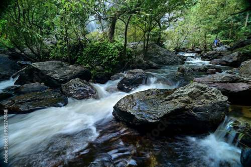 A small waterfall created from water flowing from Khlong Lan Waterfall. In Namtok Khlong Lan National Park Kamphaeng Phet Province