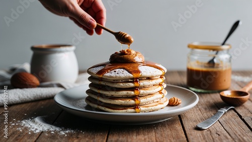 Coconut flour pancakes with almond butter closeup photo