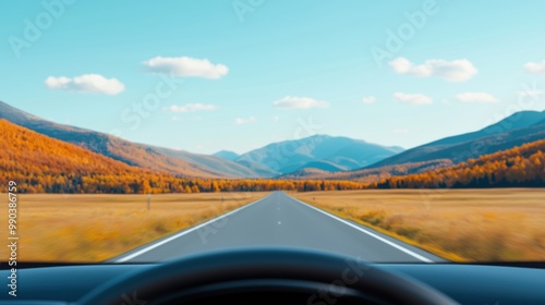 Scenic Drive Through Autumn Landscape with Mountains photo