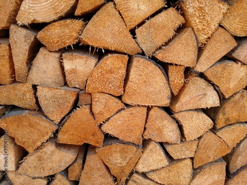 Firewood chopped dry wooden logs woodpile stacked horizontal