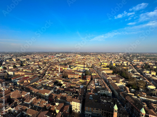 Cremona panorama of the cities seen from the Torrazzo tower at sunset. High quality photo #990452915