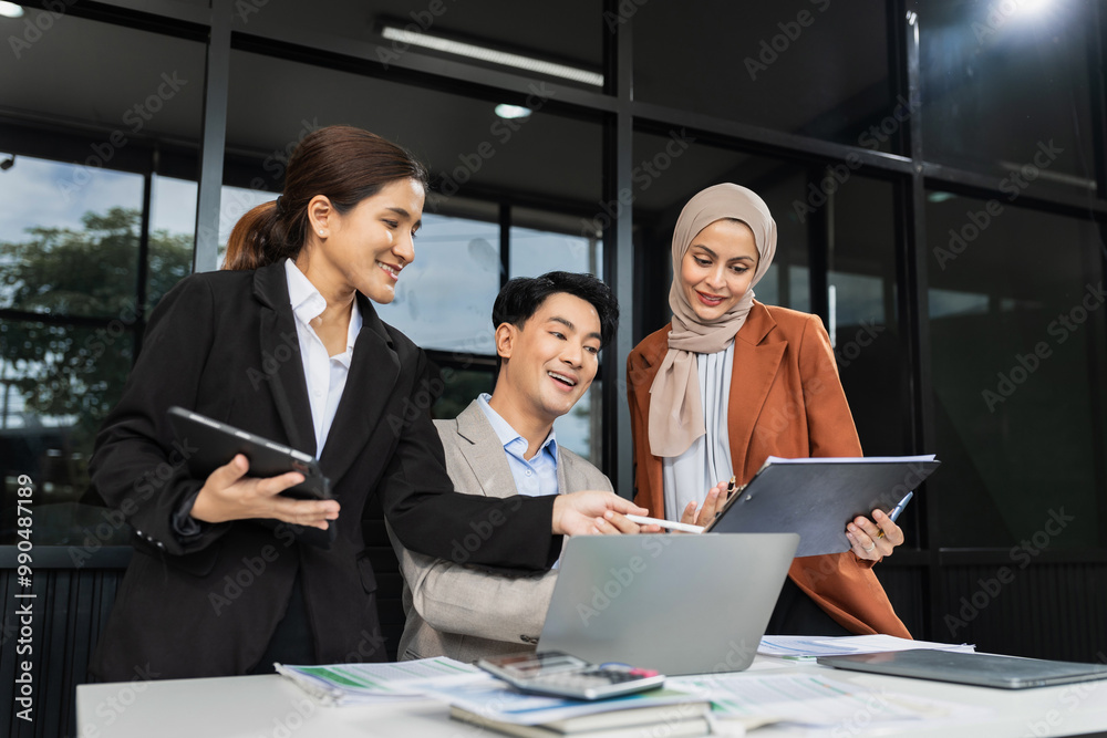 Business, technology and office concept - businessmen with laptop, tablet pc computer and papers having discussion in modern office. Business, technology and office concept - businessmen with laptop, tablet pc computer and papers having discussion in modern office.