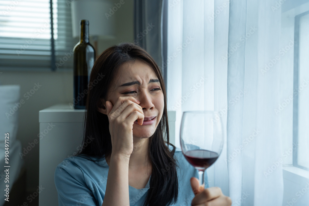 Asian young depression woman feeling heart broken and drinking wine. Asian young depression woman feeling heart broken and drinking wine.