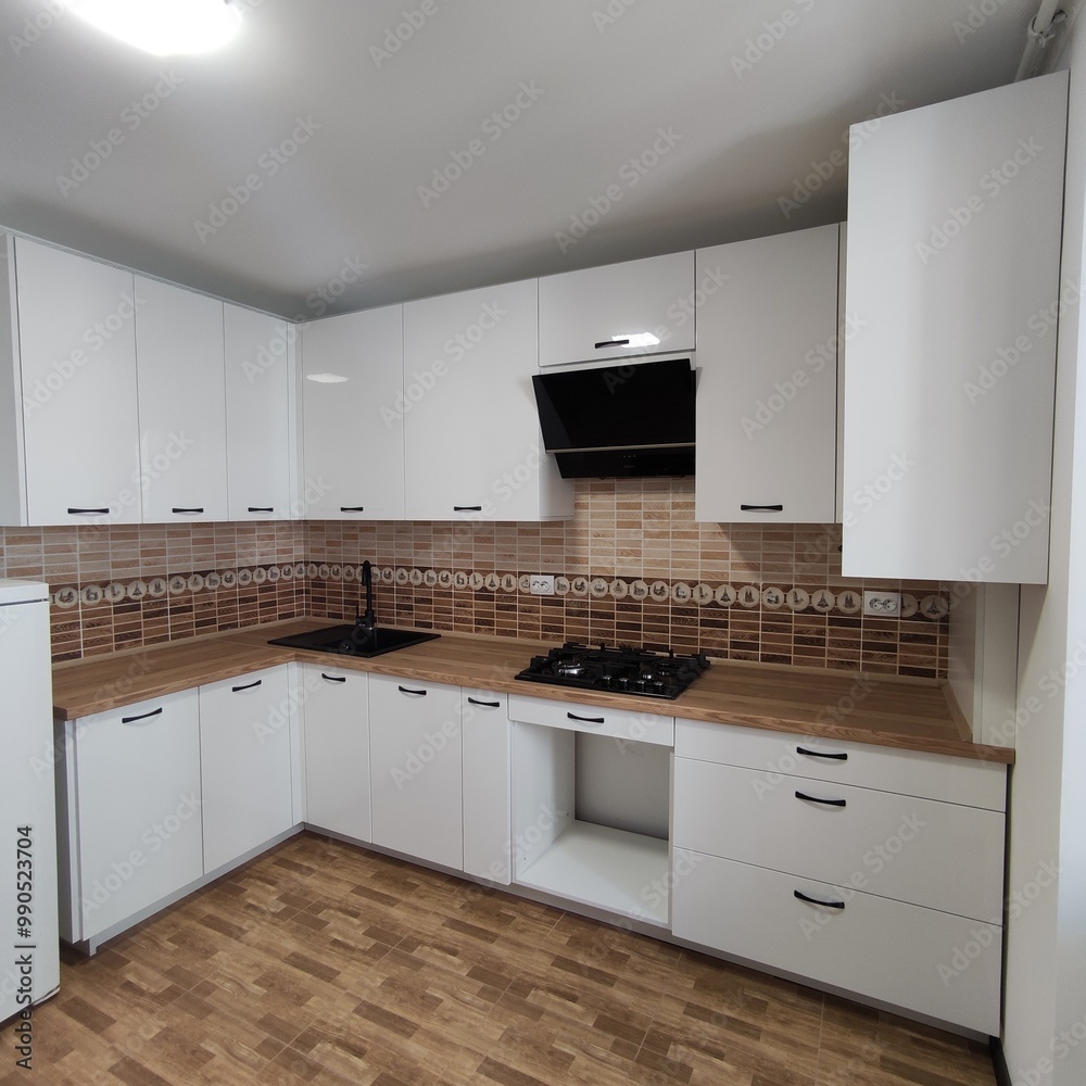 Custom white kitchen made of chipboard and MDF Custom white kitchen made of chipboard and MDF