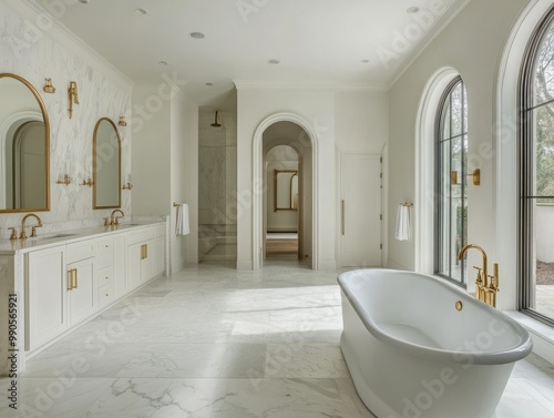 Marble tiles, large soaking tub, double vanity with gold fixtures, and a spacious walk-in shower with multiple showerheads