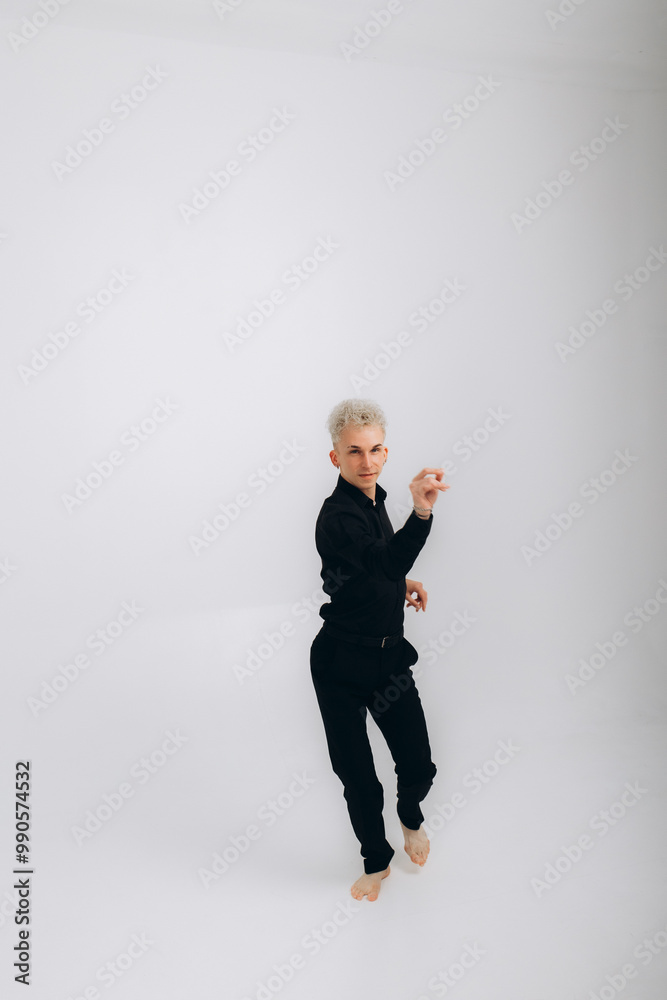 man in black dancing on a white background man in black dancing on a white background