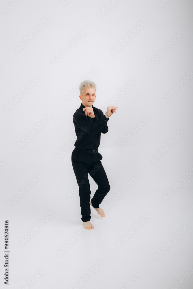 man dances bachata solo on a white background man dances bachata solo on a white background