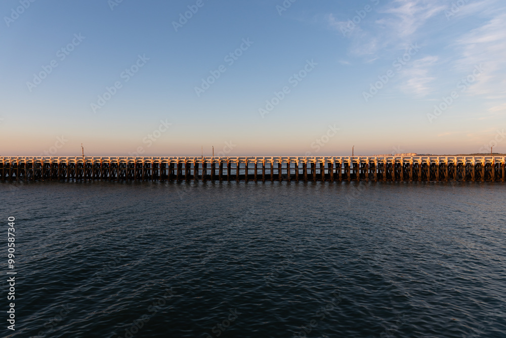 Fototapeta premium Old wooden pier on the sea shore