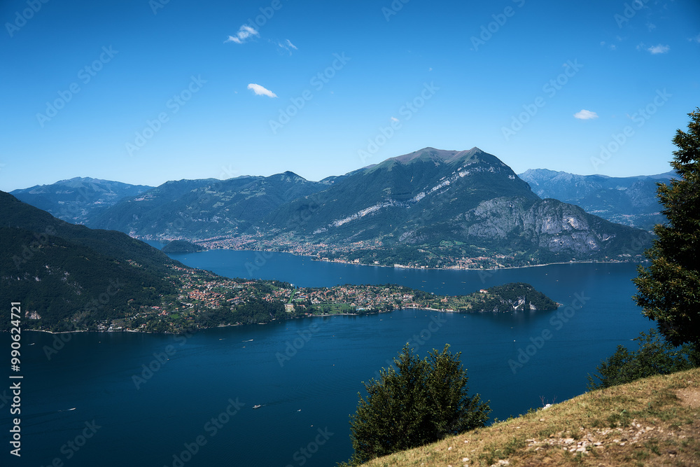 Fototapeta premium Lake Como with charming yachts surrounded by hills