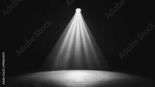 Spotlight illuminating a dark stage, creating a dramatic effect for a performance