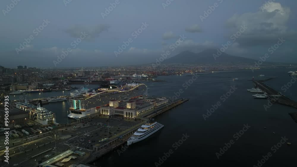 Naples Ferry Terminal at night from a drone, Molo Immacolatella Vecchia, Naples, Campania, Italy, Europe Naples Ferry Terminal at night from a drone, Molo Immacolatella Vecchia, Naples, Campania, Italy, Europe