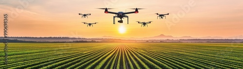 Aerial view of drones flying over green fields at sunset, showcasing modern agriculture technology and innovation in farming.