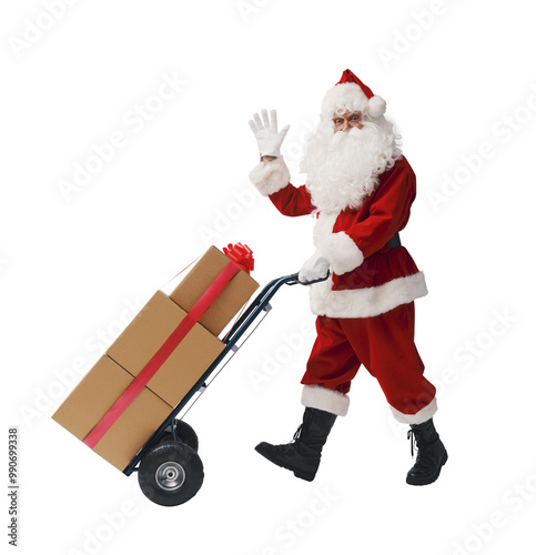 Happy Santa Claus pushing a hand truck