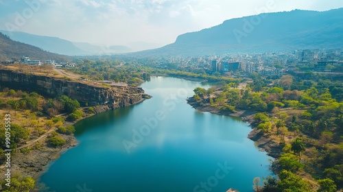 Pune offers a stunning view of Katraj, where lush greenery meets rolling hills under a clear sky.  photo