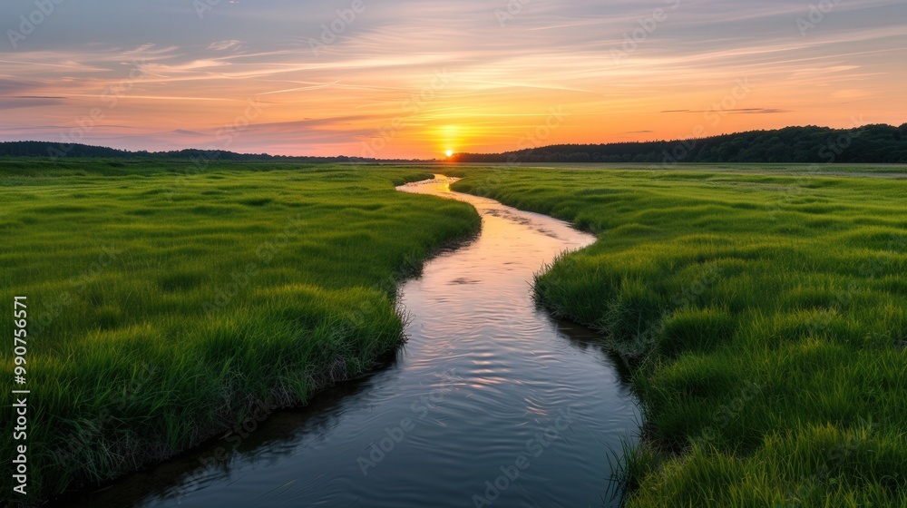 Tranquil Sunset Over Grassy Field and River, a breathtaking view of a vibrant sunset casting warm hues over a lush landscape, creating a peaceful and calming ambiance.